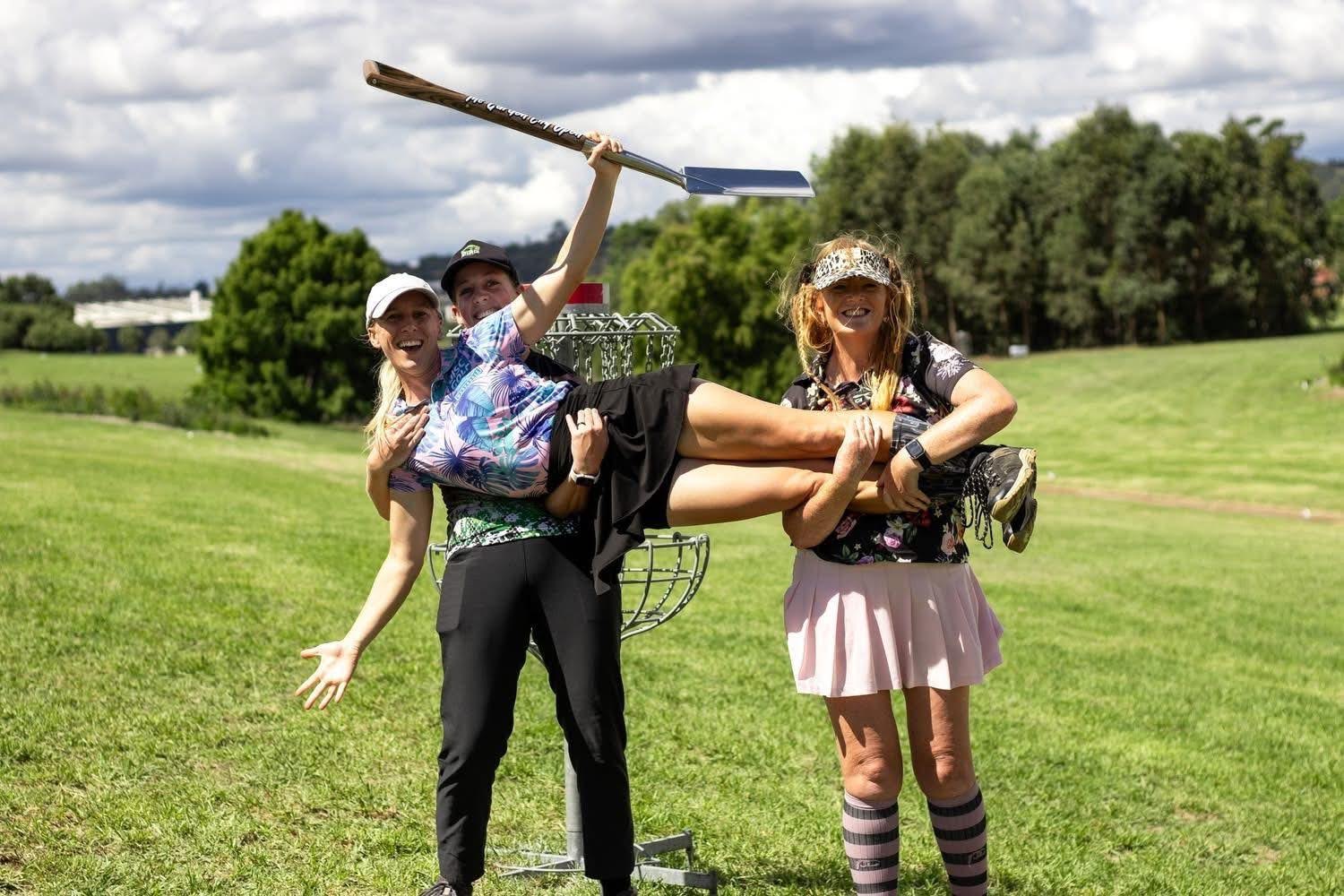 Volunteers celebrating course maintenance